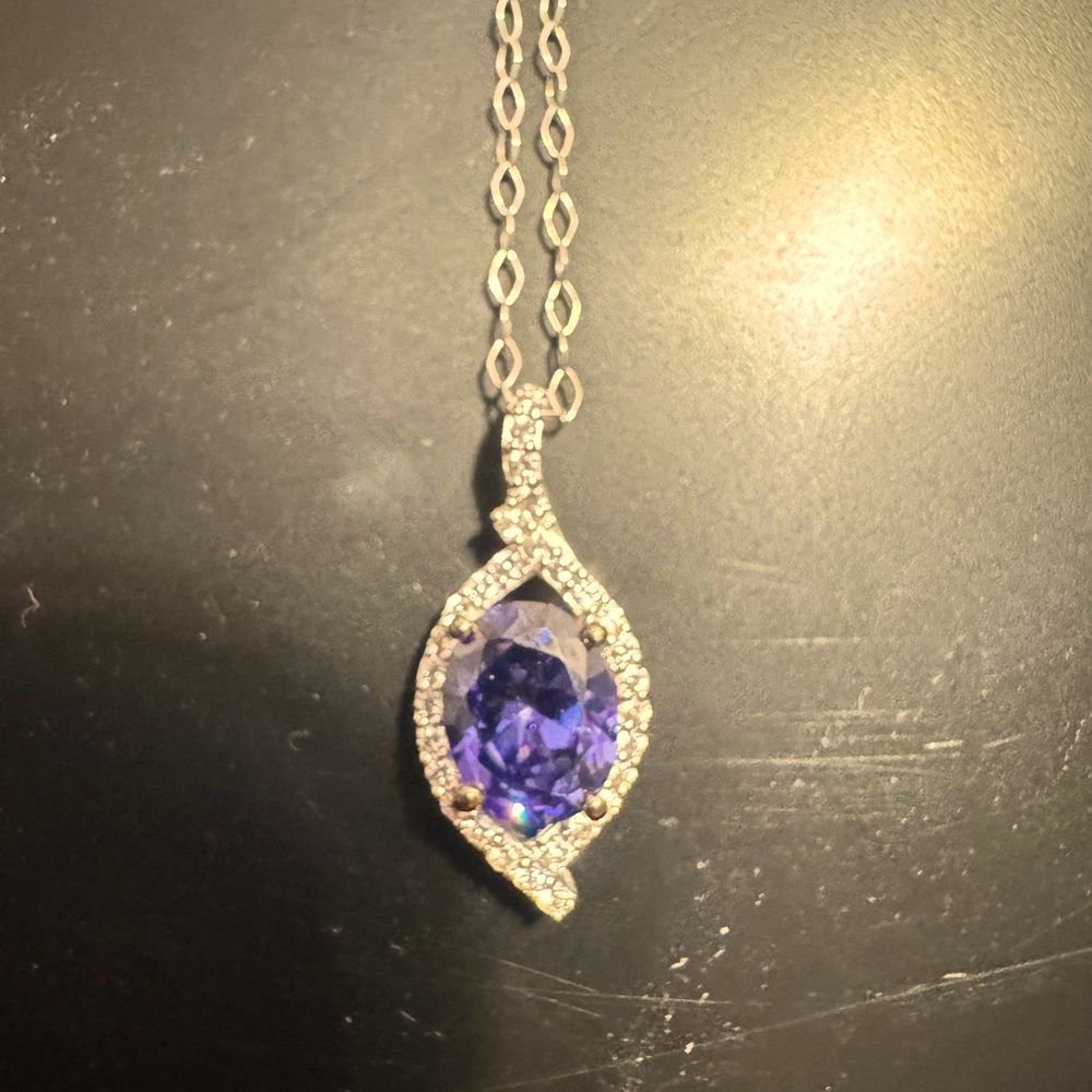 Tanzanite and diamond pendant. Never worn.